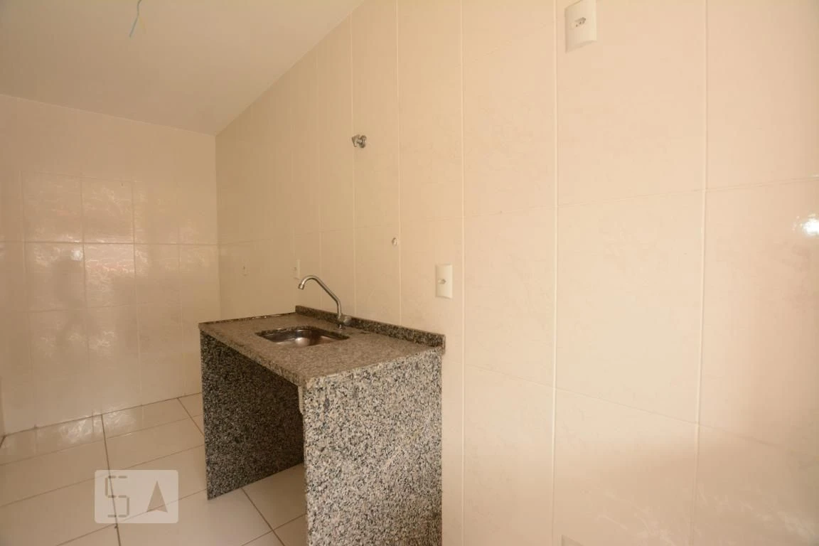 2-bedroom apartment with balcony sink and utility area — photo 13