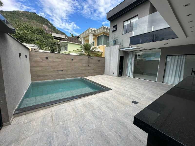 Casa com 4 suítes e 292 m², com 3 vagas e churrasqueira — photo 12