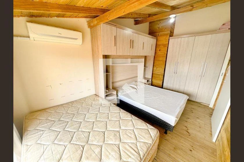 2-bedroom apartment in a building with a pool — photo 13