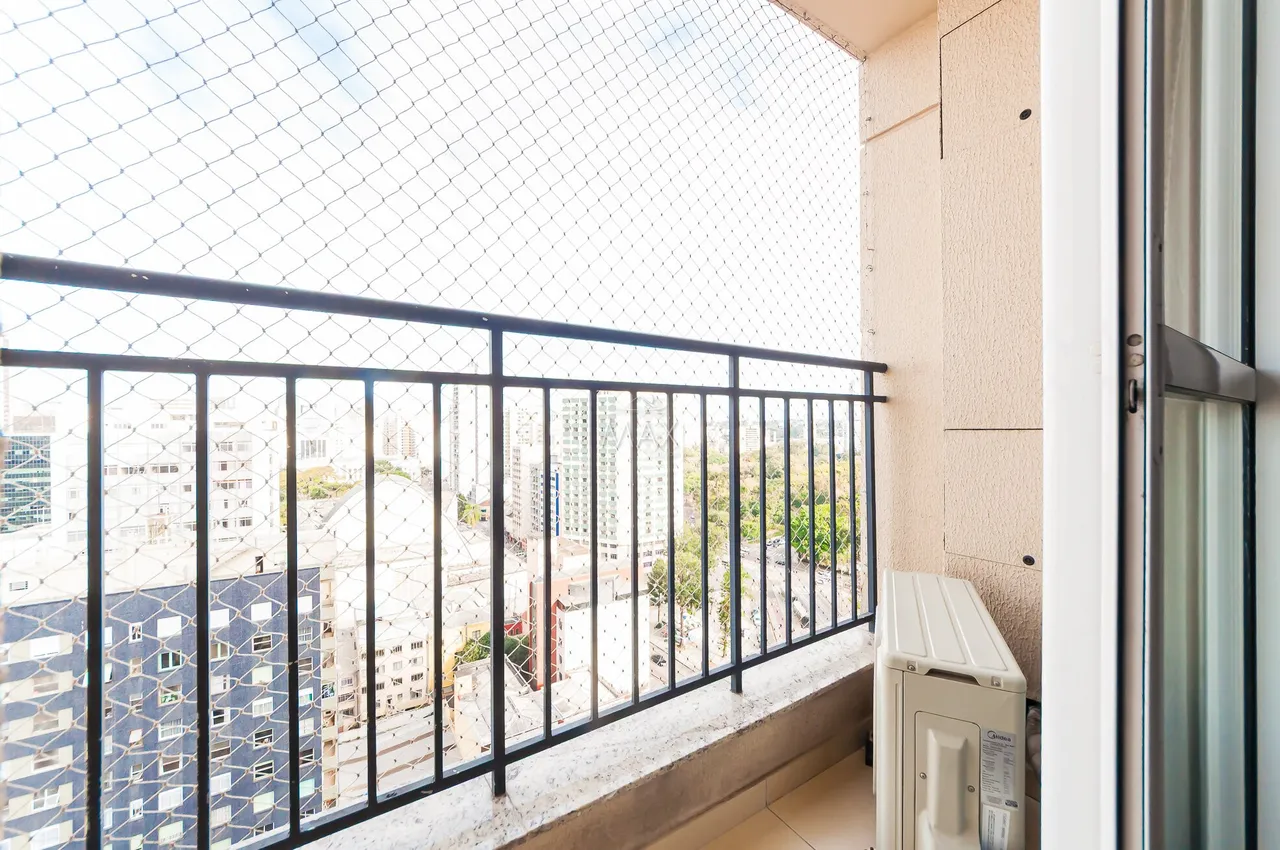 Furnished studio with balcony and open-plan kitchen — photo 10