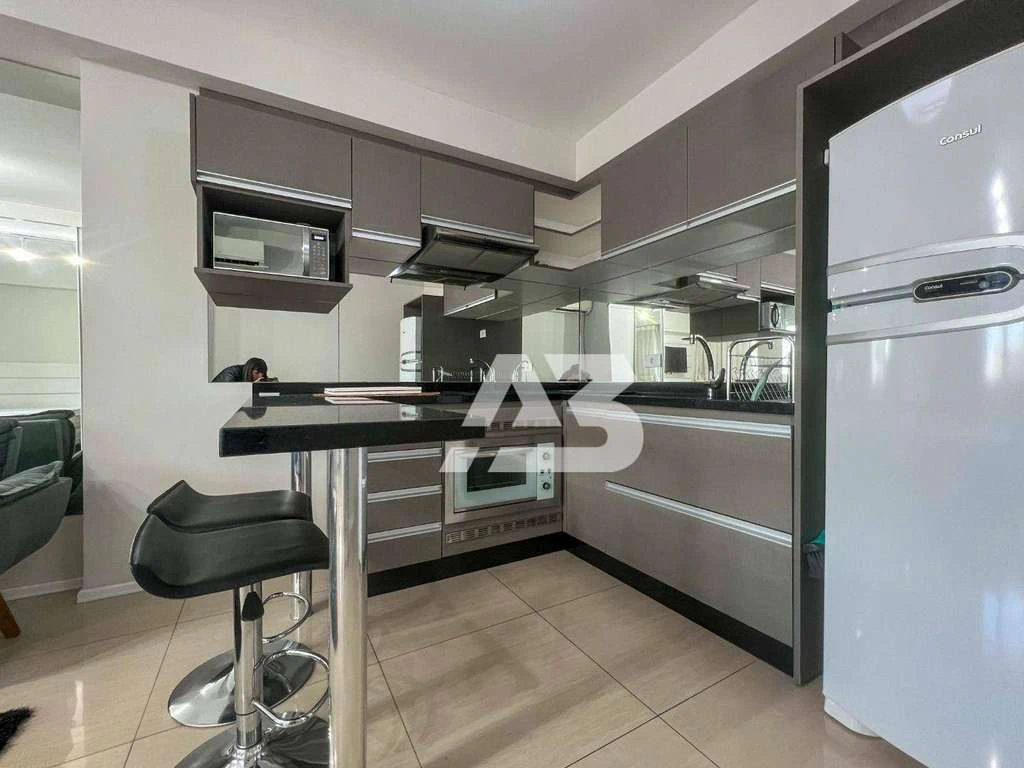 Furnished 32 m² studio with an open-plan kitchen — photo 4