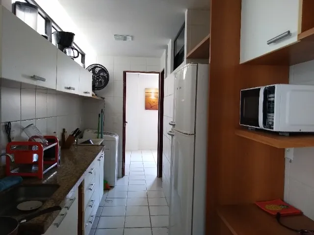 3-bedroom apartment with laundry area — photo 3