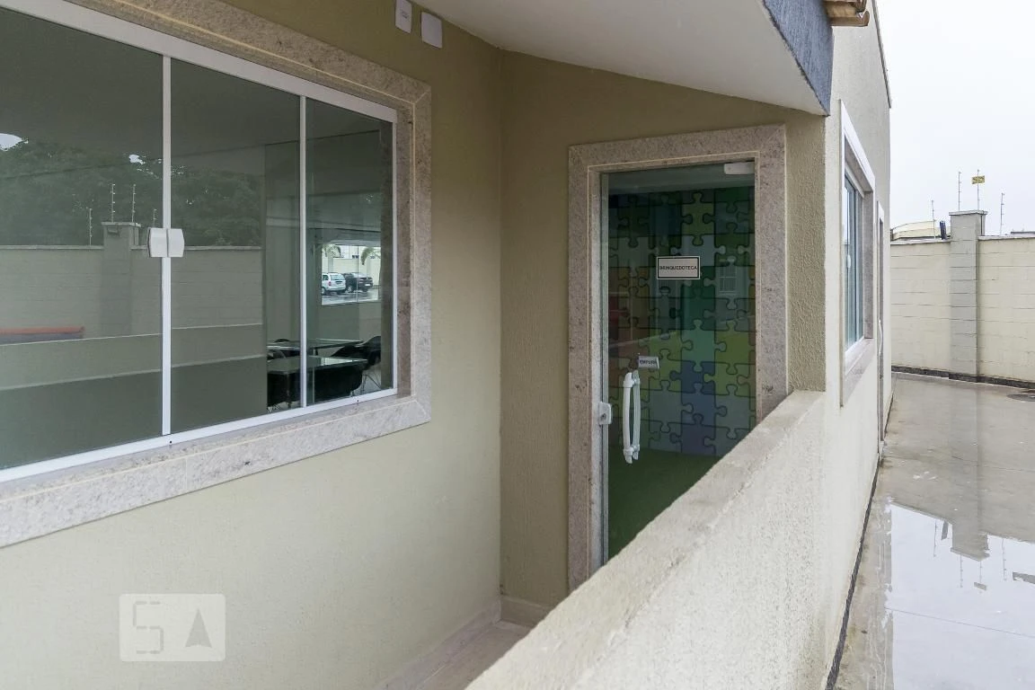 2-bedroom apartment in a building with a pool — photo 33