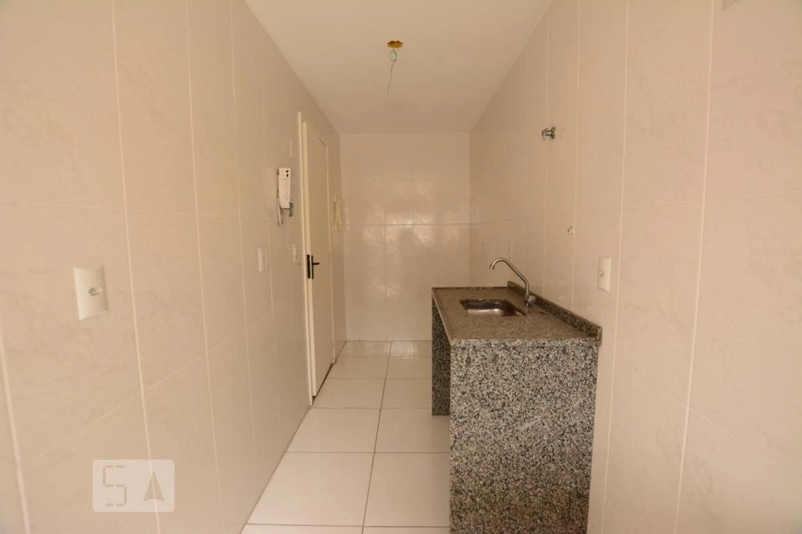 2-bedroom apartment with balcony sink and utility area — photo 2