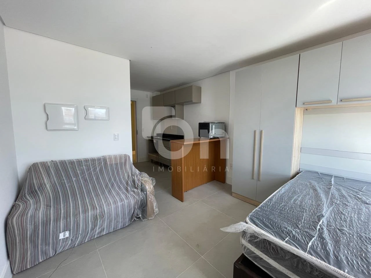 One-bedroom apartment with floor-to-ceiling windows