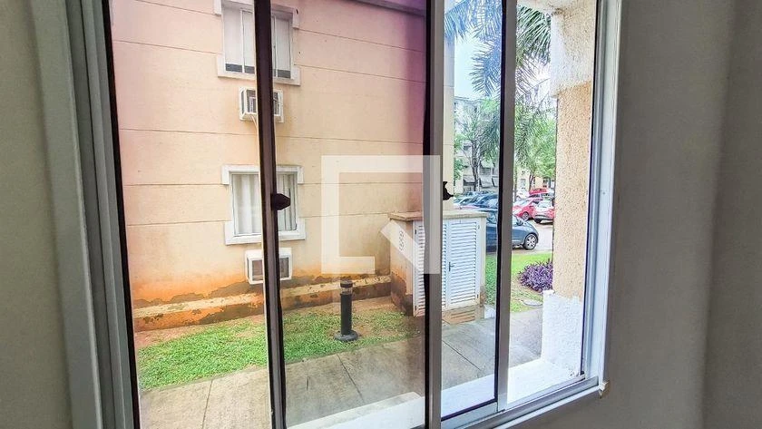 2-bedroom apartment in a building with a pool — photo 9