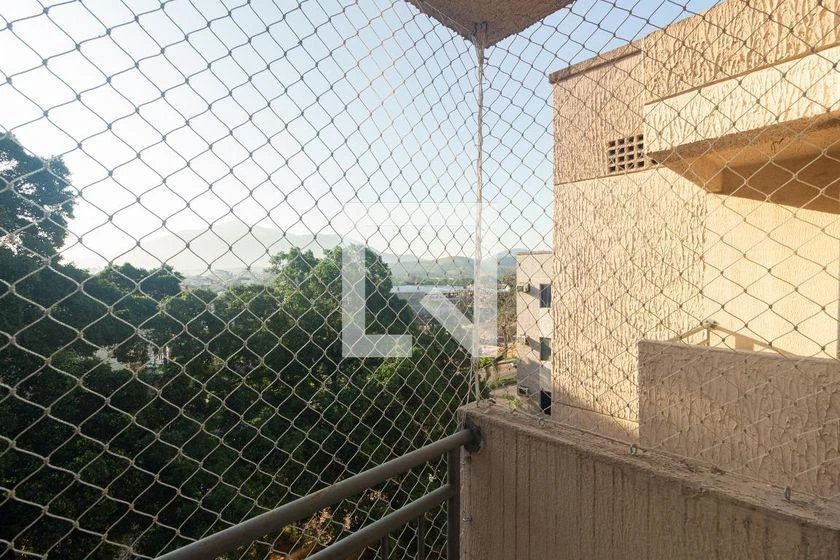 2-bedroom apartment in a building with a pool — photo 34