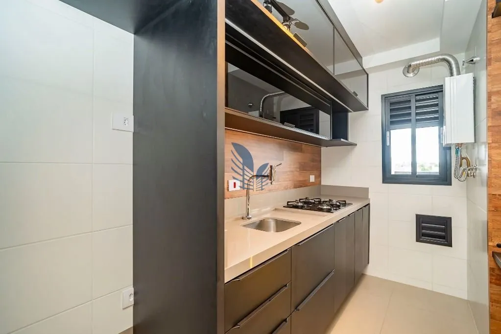 1-bedroom rental with open-plan kitchen and BBQ — photo 7
