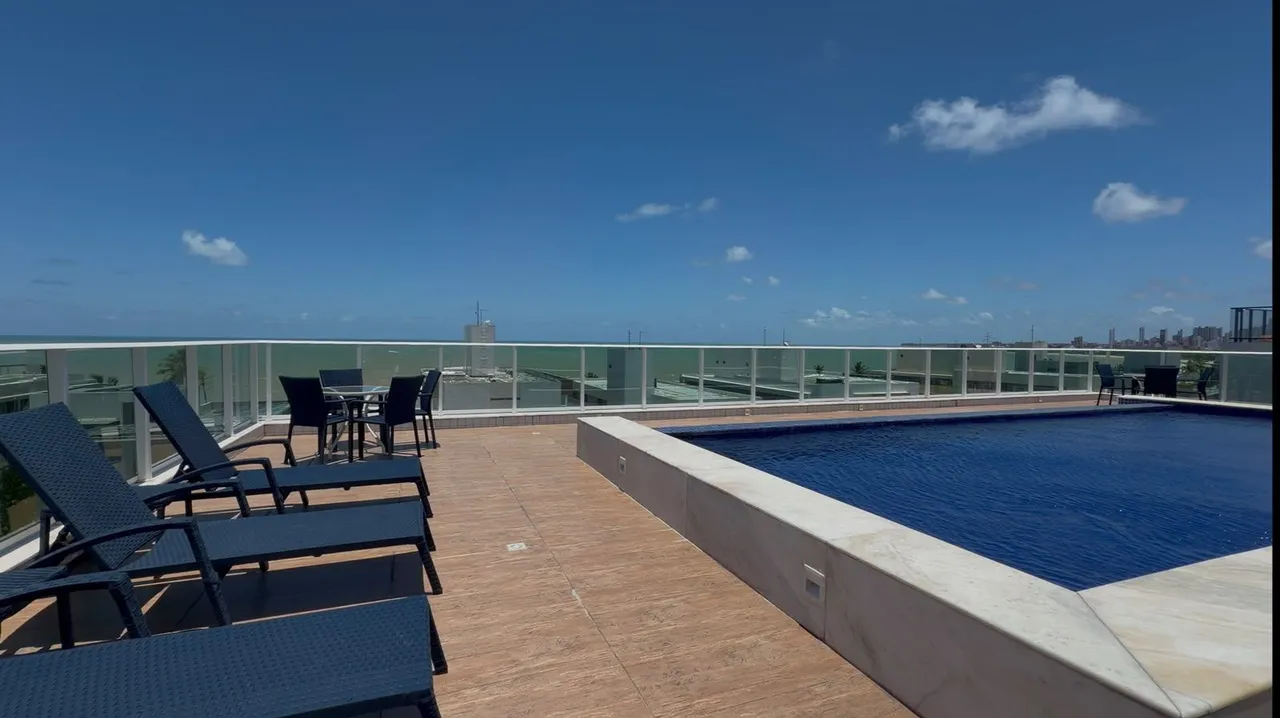 2-bedroom apartment in a building with a pool — photo 19