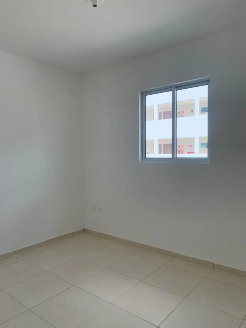 2-bedroom apartment in a building with a pool — photo 4