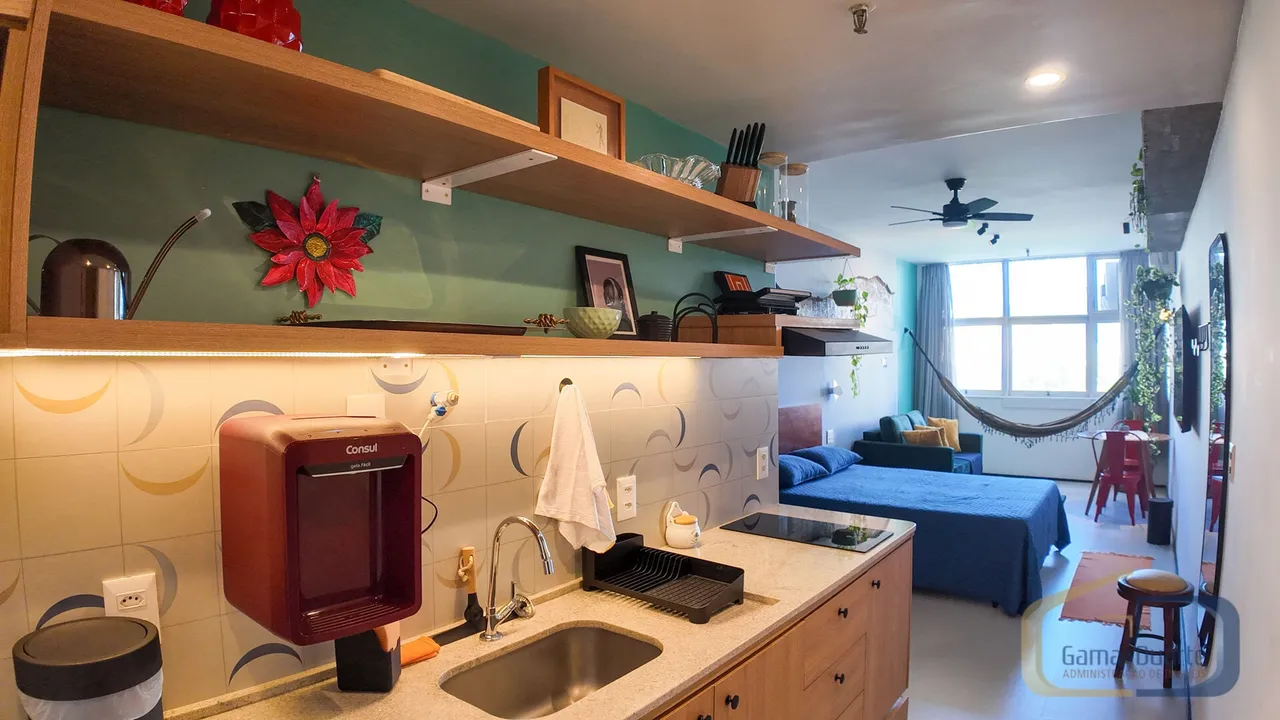 Furnished apartment with open-plan kitchen and glass shower — photo 2