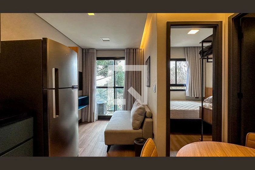 1-bedroom apartment with open-plan kitchen and balcony — photo 10