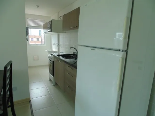 Furnished 43 m² studio with an open kitchen layout — photo 6