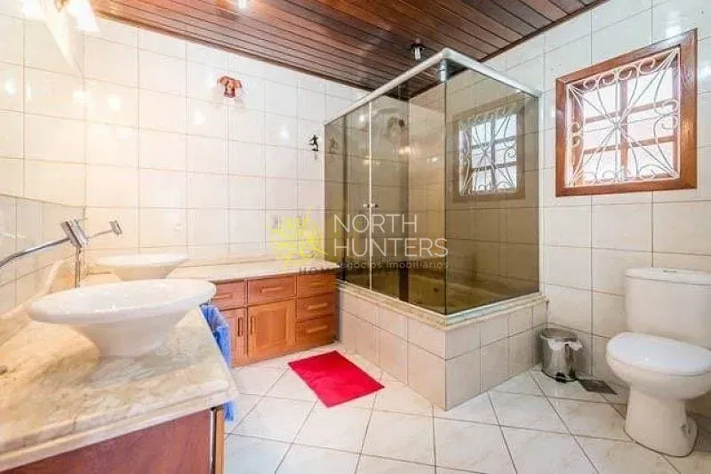 Casa com 4 dormitórios, 2 suítes e churrasqueira na varanda — photo 2