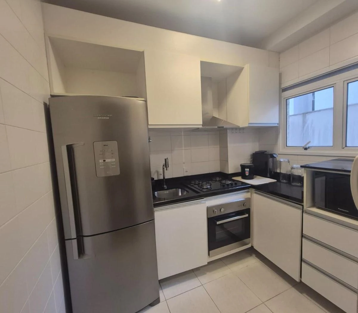One-bedroom apartment with a washing machine — photo 2