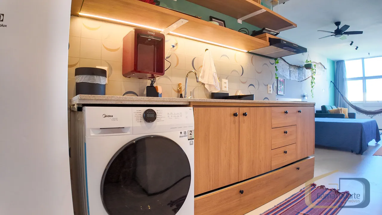 Furnished apartment with open-plan kitchen and glass shower — photo 9