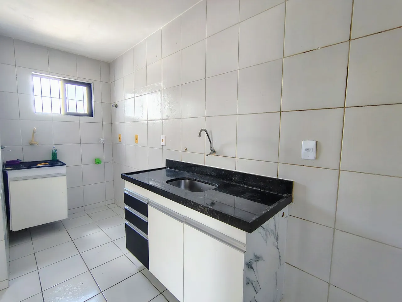2-bedroom apartment in a building with a pool — photo 3