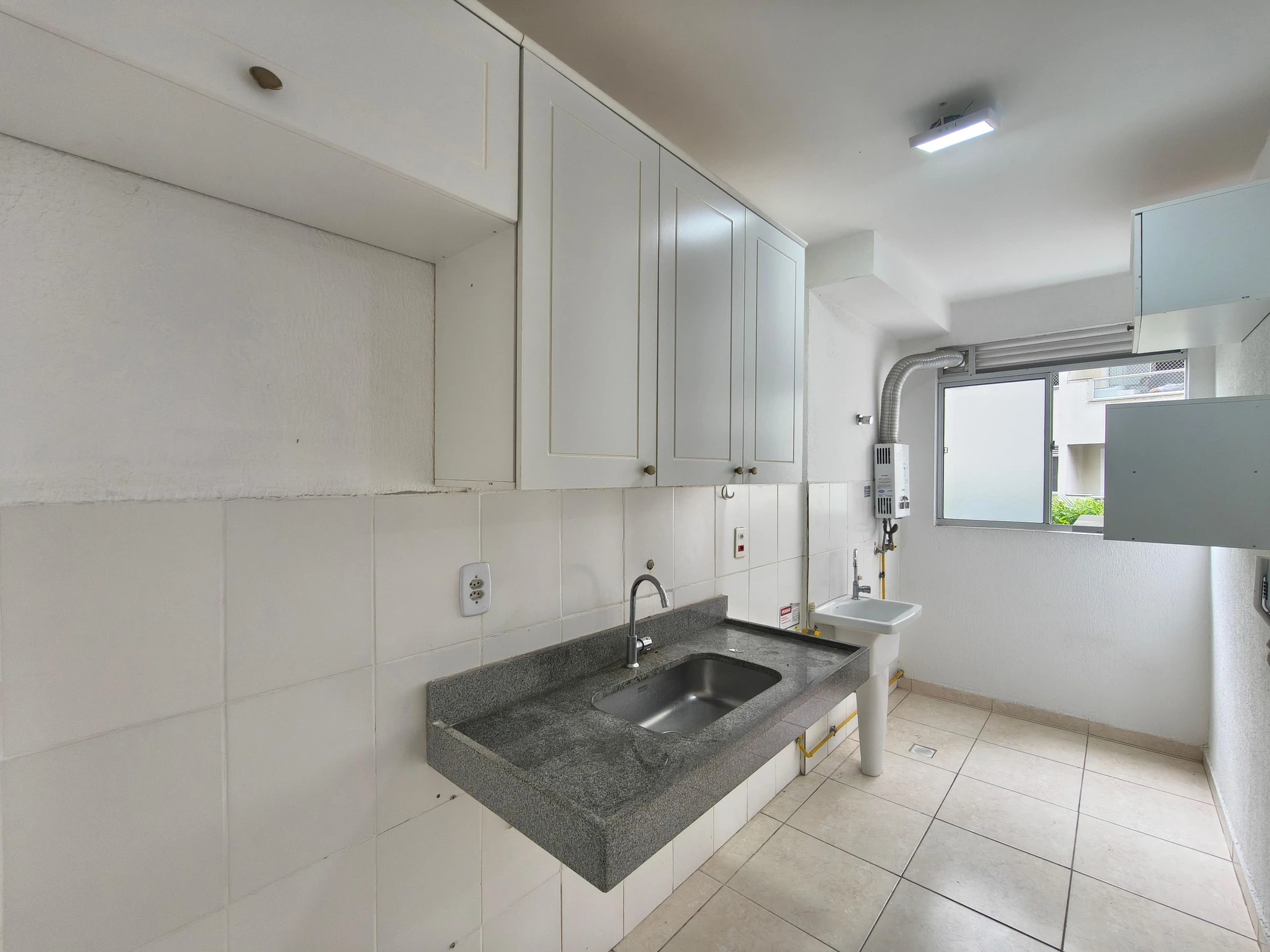 2-bedroom apartment in a building with a pool — photo 12