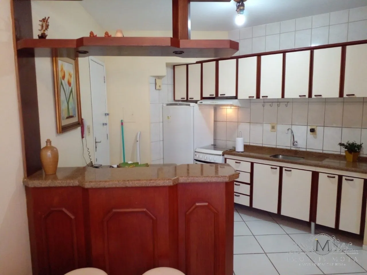 Apartamento de 30 m² com vista para a água e secadora