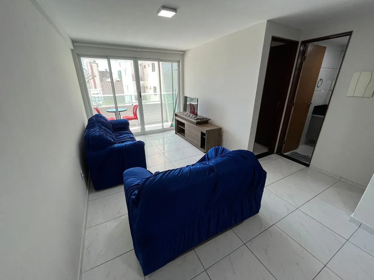 2-bedroom apartment in a building with a pool — photo 7