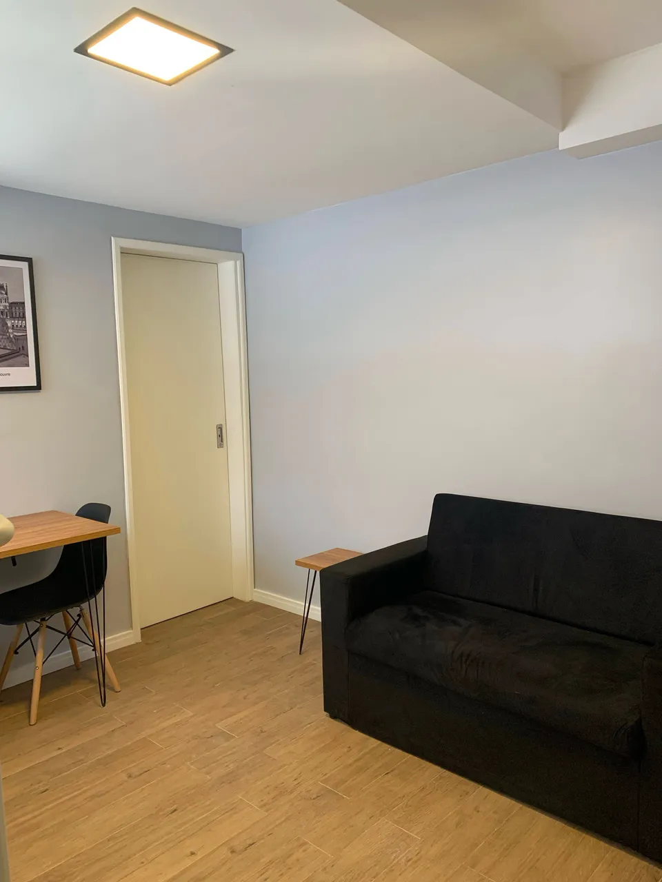 Furnished studio with a compact kitchenette and gas stove