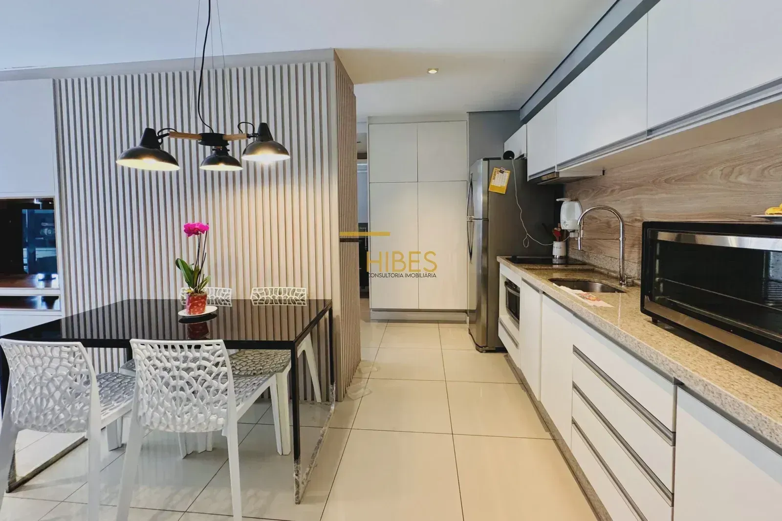 Apartamento de 1 dormitório com cozinha integrada e varanda — photo 4