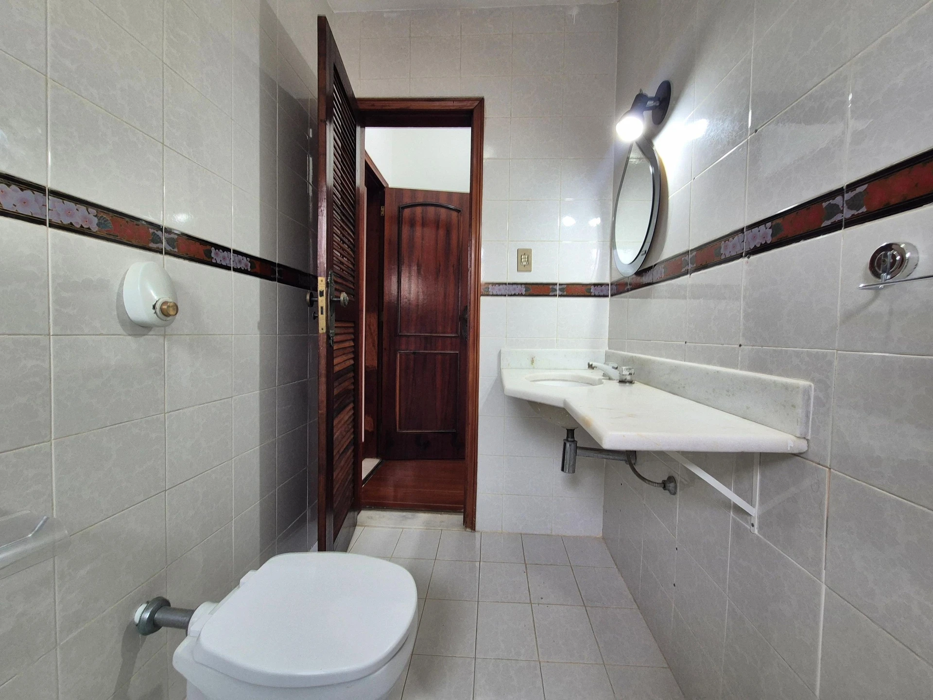 Casa em condomínio com 3 suítes e churrasqueira na varanda — photo 46