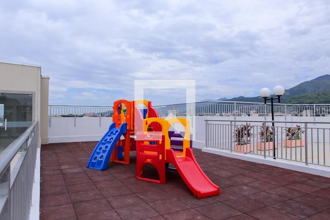 2-bedroom apartment in a building with a pool — photo 16