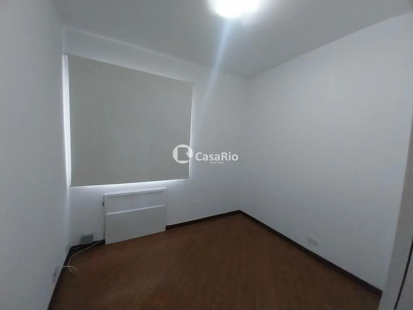 2-bedroom apartment with wood or laminate floors — photo 3