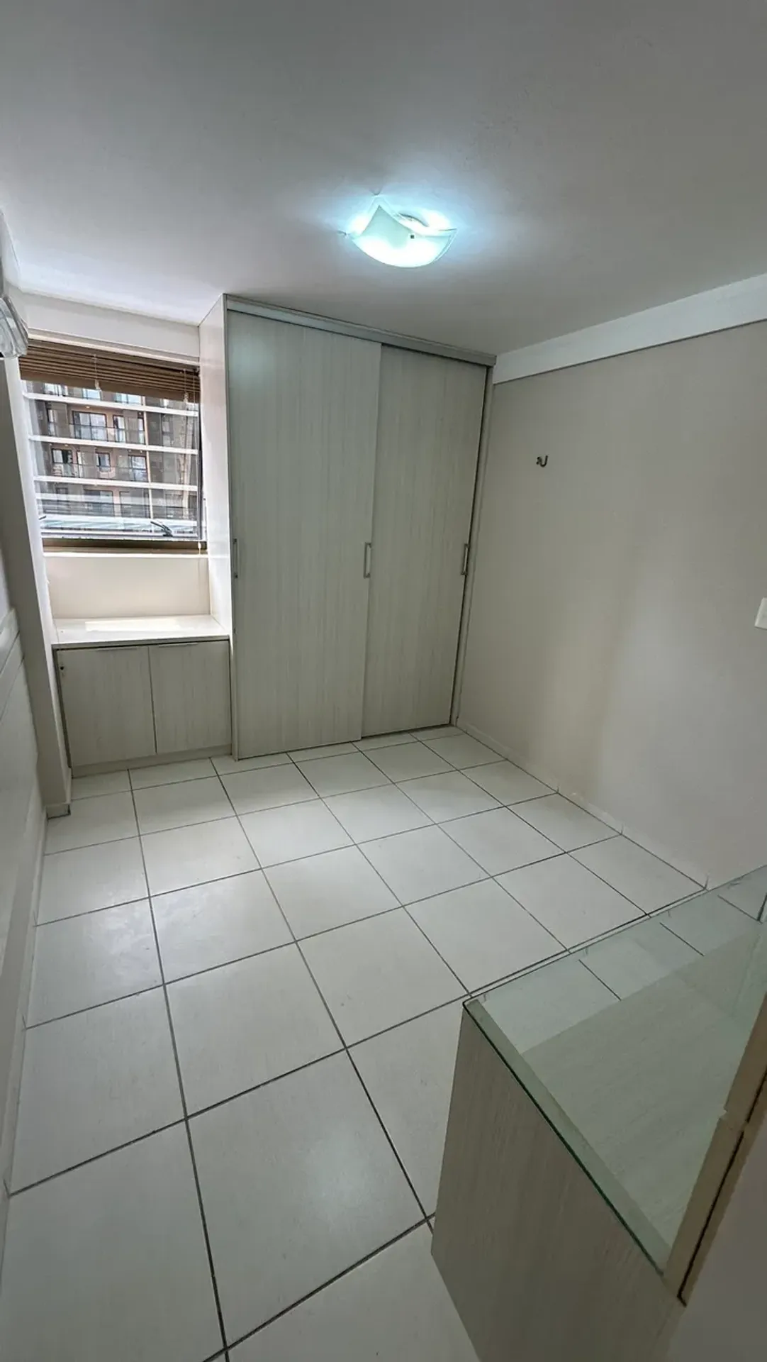 2-bedroom apartment in a building with a pool — photo 13