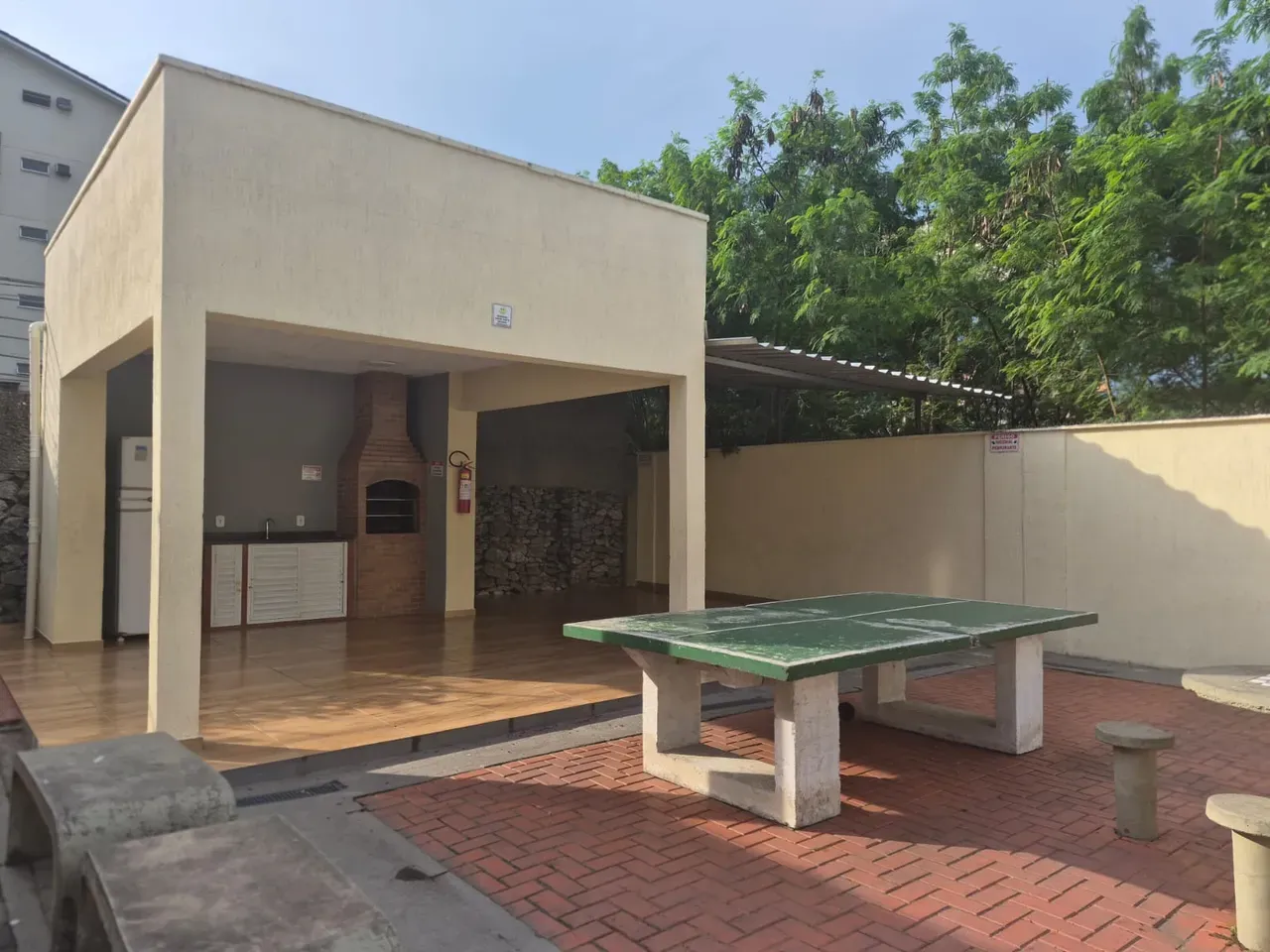 2-bedroom apartment in a building with a pool — photo 11