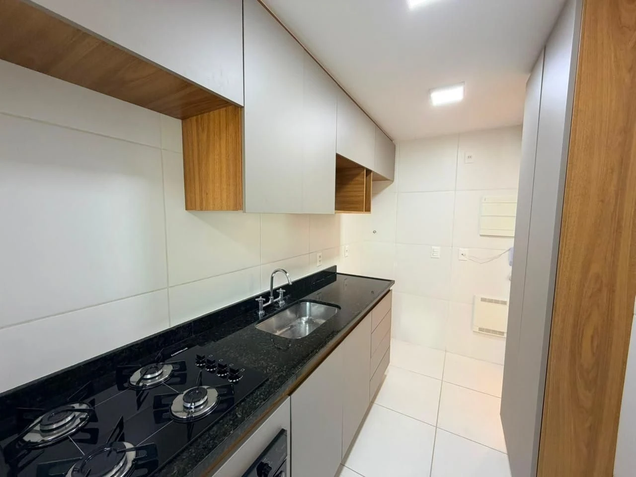 Apartamento com varanda e cozinha integrada a gás — photo 18