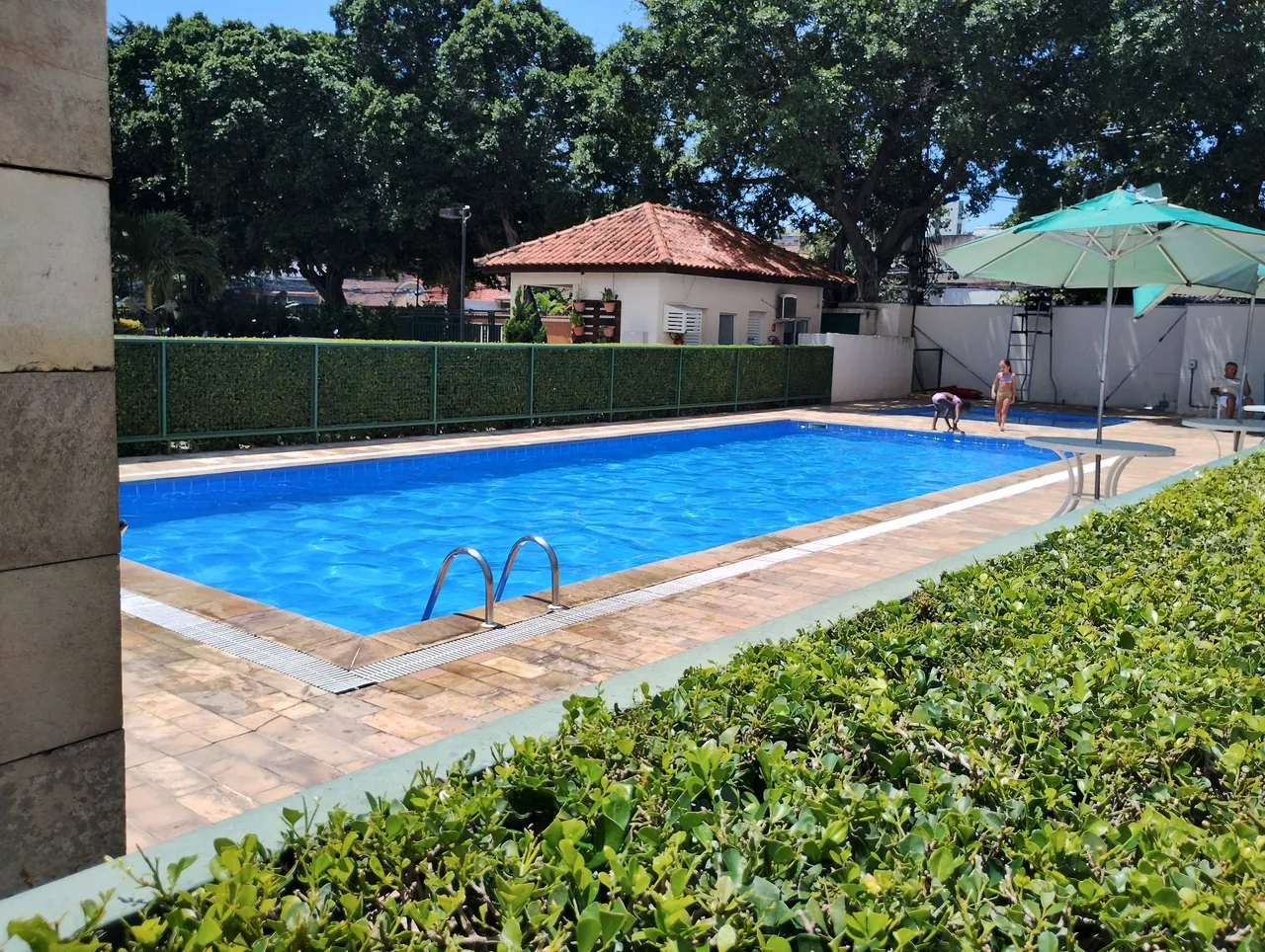 2-bedroom apartment in a building with a pool — photo 8