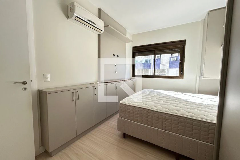 2-bedroom apartment in a building with a pool — photo 6