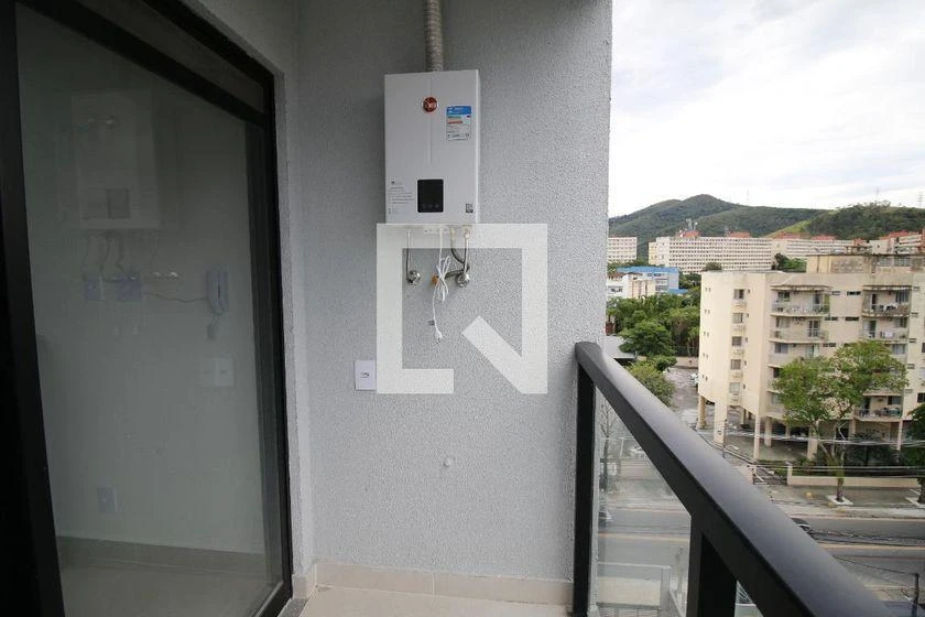 2-bedroom apartment in a building with a pool — photo 13