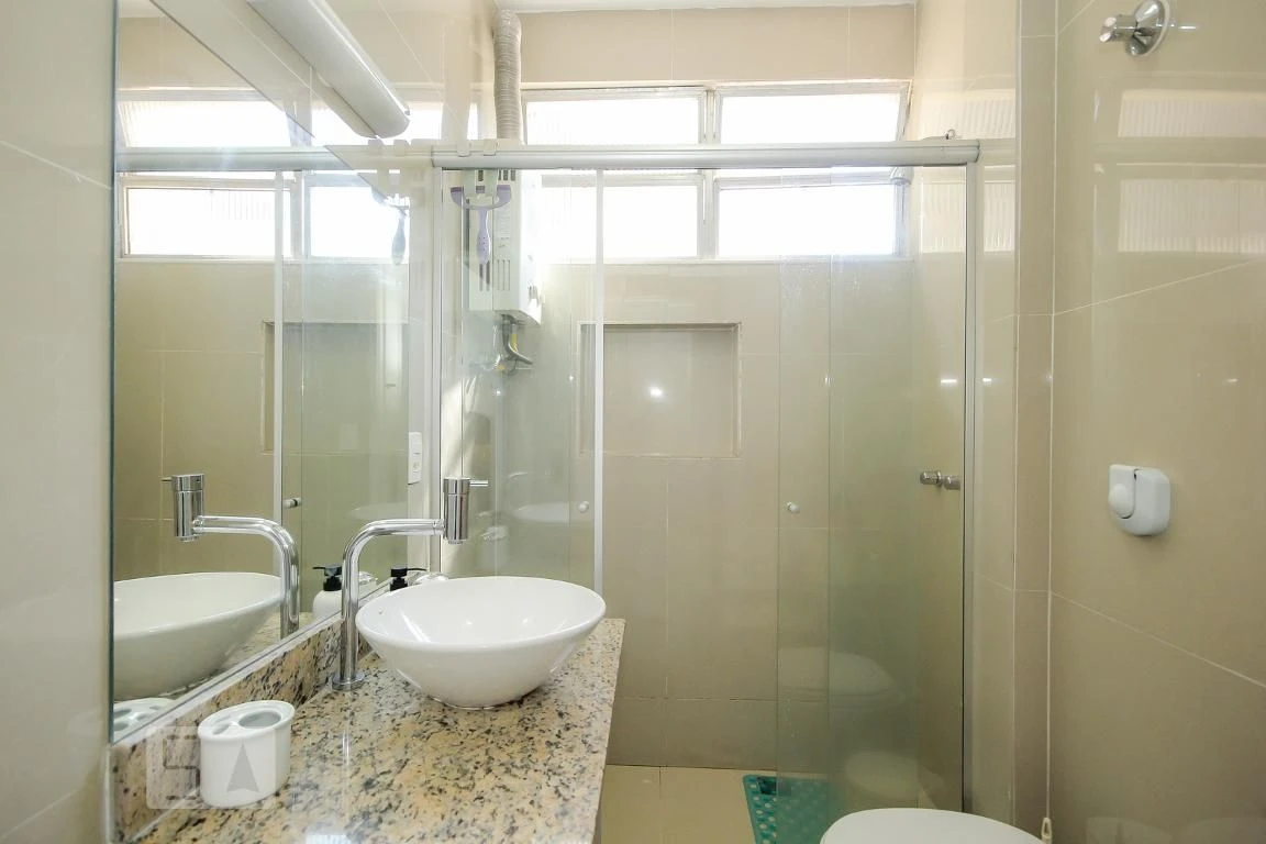 Furnished 2-bedroom apartment with laundry area — photo 13