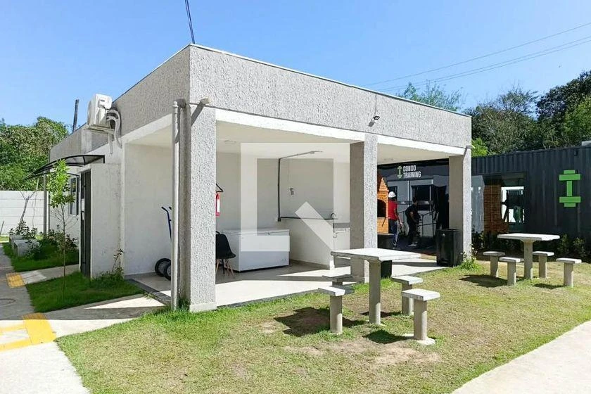 2-bedroom apartment in a building with a gym