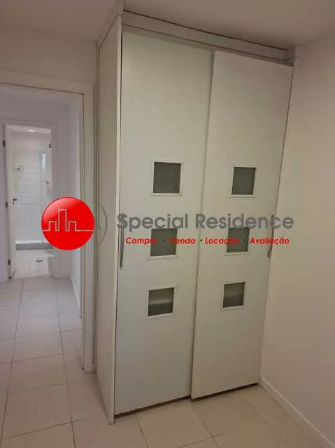 2-bedroom apartment in a building with a pool — photo 13