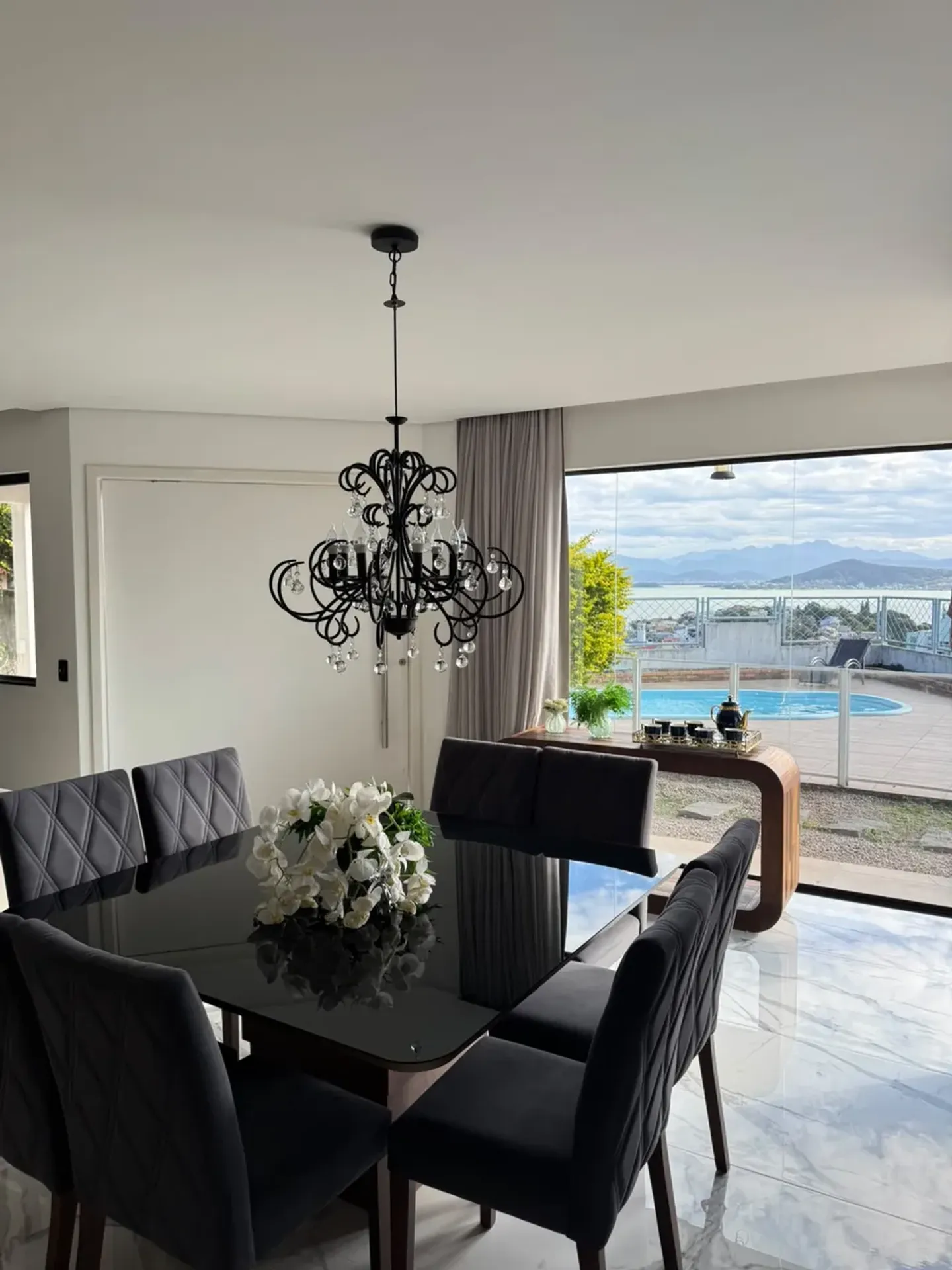 620 m² house with a glass-enclosed balcony and a water view — photo 14