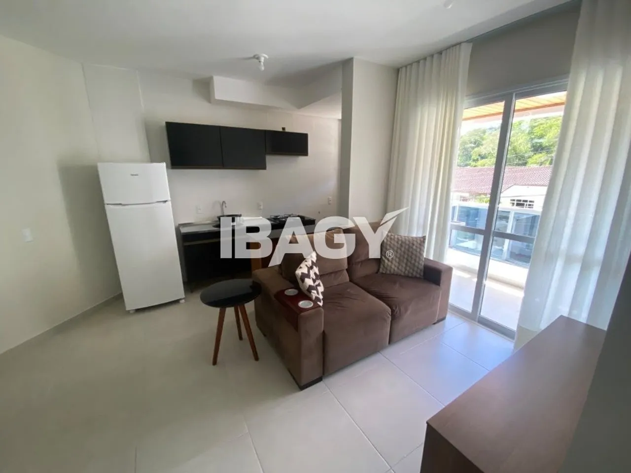 2-bedroom apartment in a building with a pool — photo 4