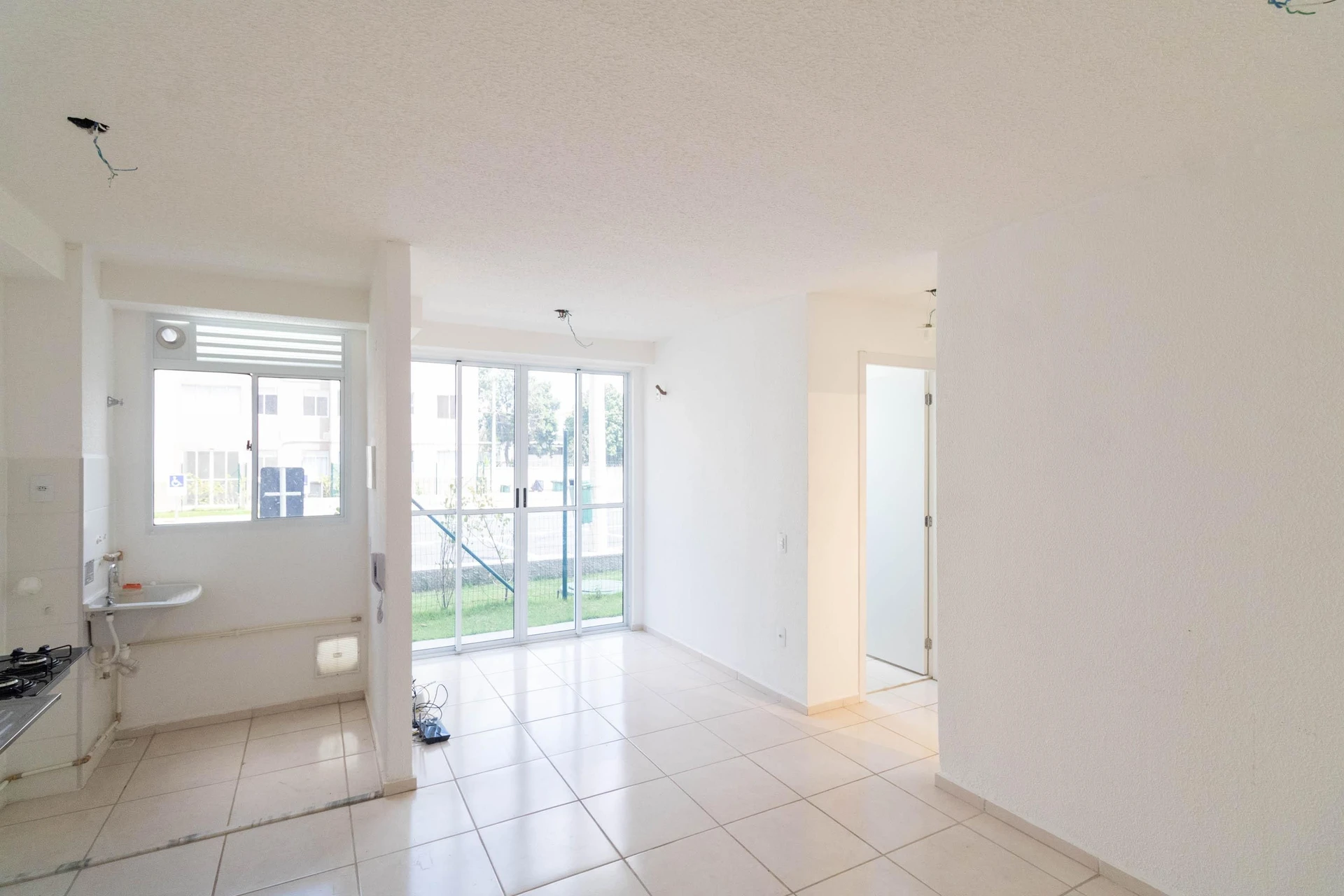 2-bedroom apartment in a building with a pool — photo 2