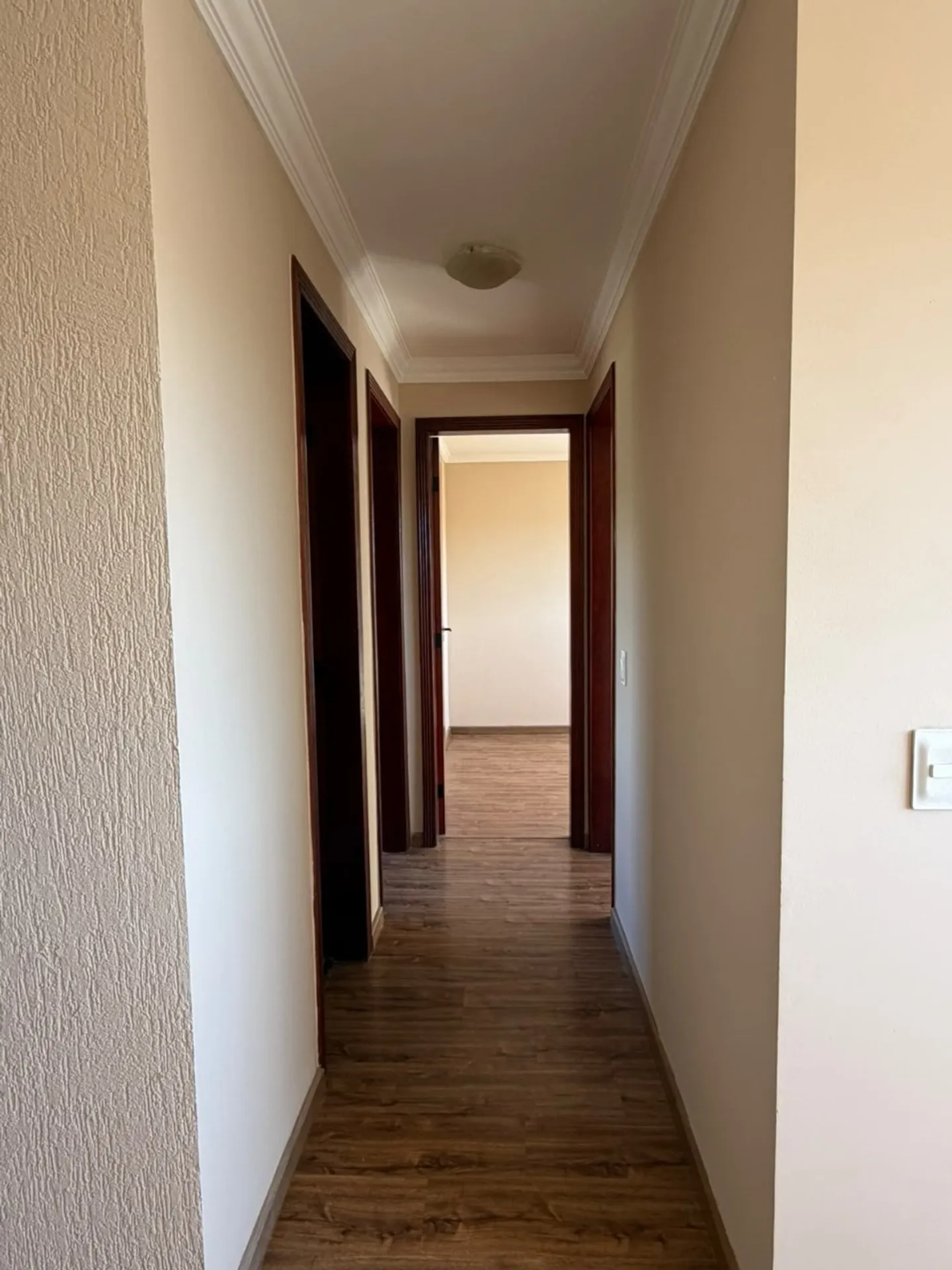 Wood or laminate floors in a 3-bedroom apartment, 65 m² — photo 11