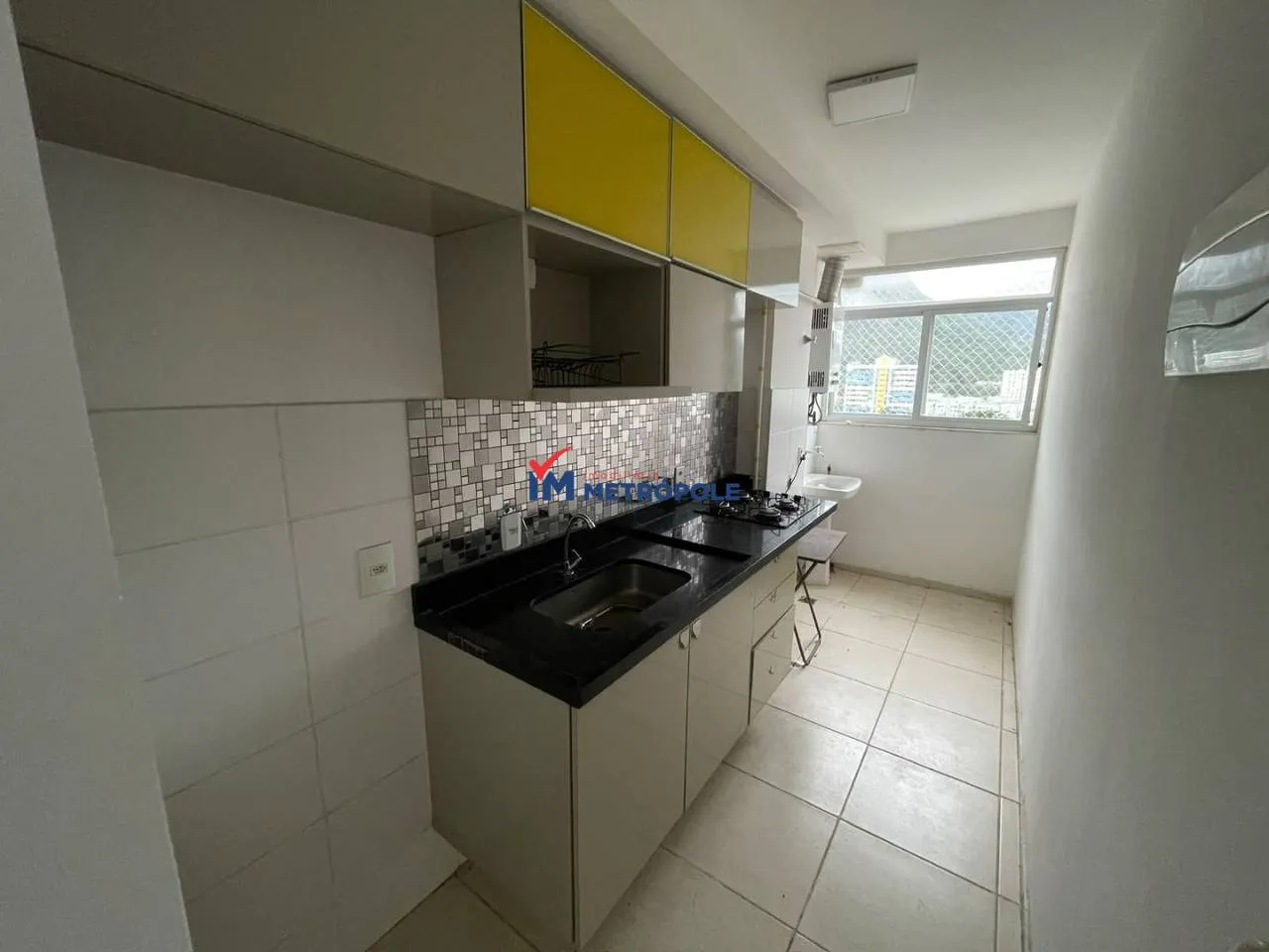 2-bedroom apartment in a building with a pool — photo 2