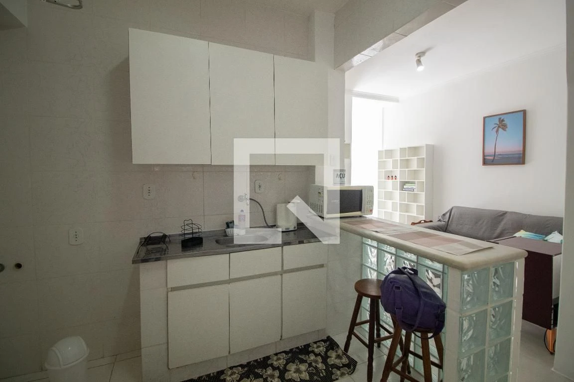 1-bedroom apartment with open kitchen and electric stove — photo 7