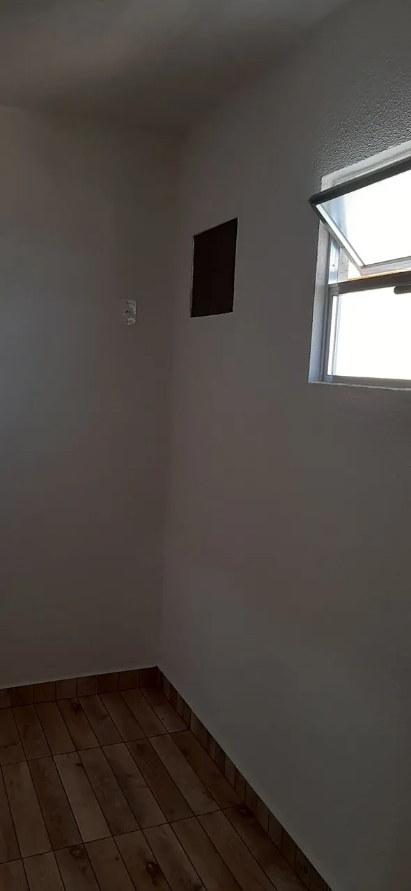Studio-sized kitinete with 1 bedroom and compact kitchenette — photo 10