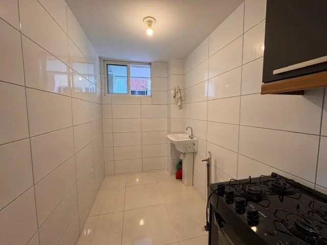 2-bedroom apartment in a building with a pool — photo 8