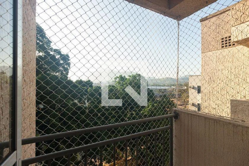 2-bedroom apartment in a building with a pool — photo 14