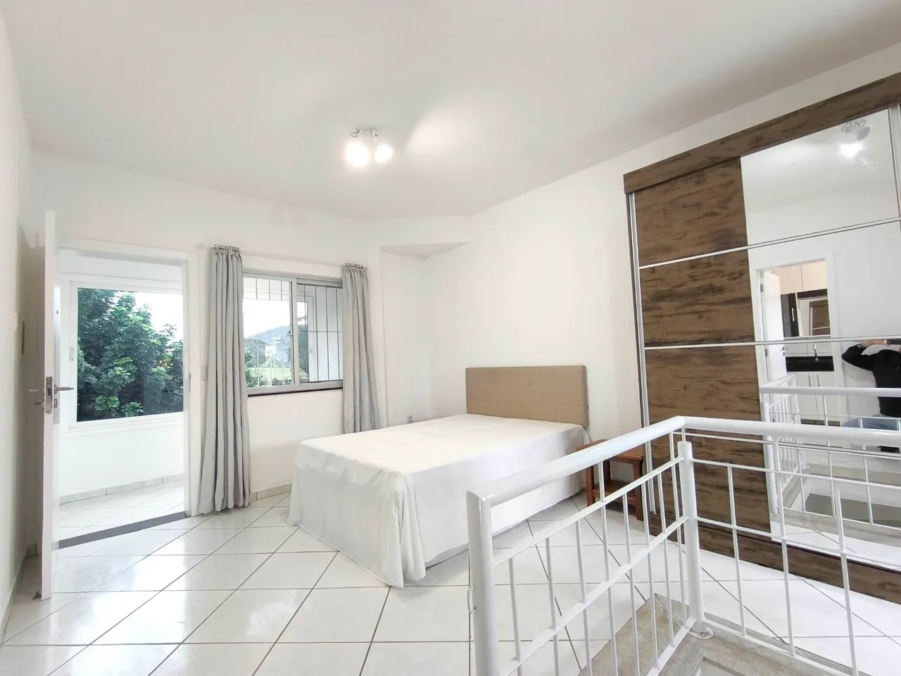 One-bedroom apartment in a building with a pool — photo 5