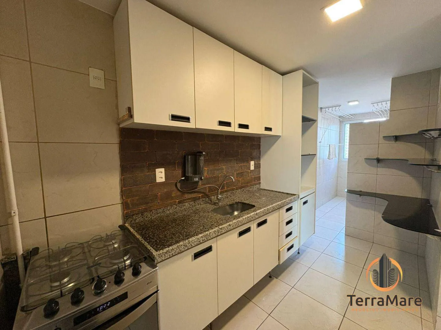2-bedroom apartment in a building with a pool — photo 2