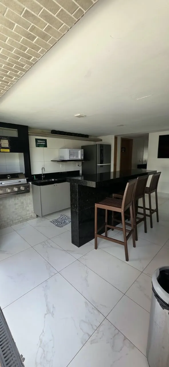 2-bedroom apartment in a building with a gym